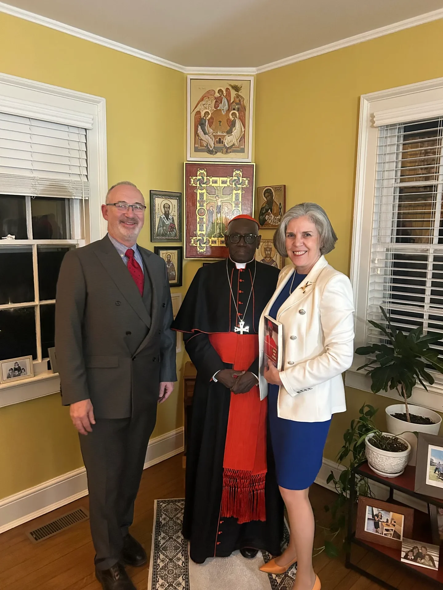 David and Margarita Clayton with Cardinal Robert Sarah in their home.